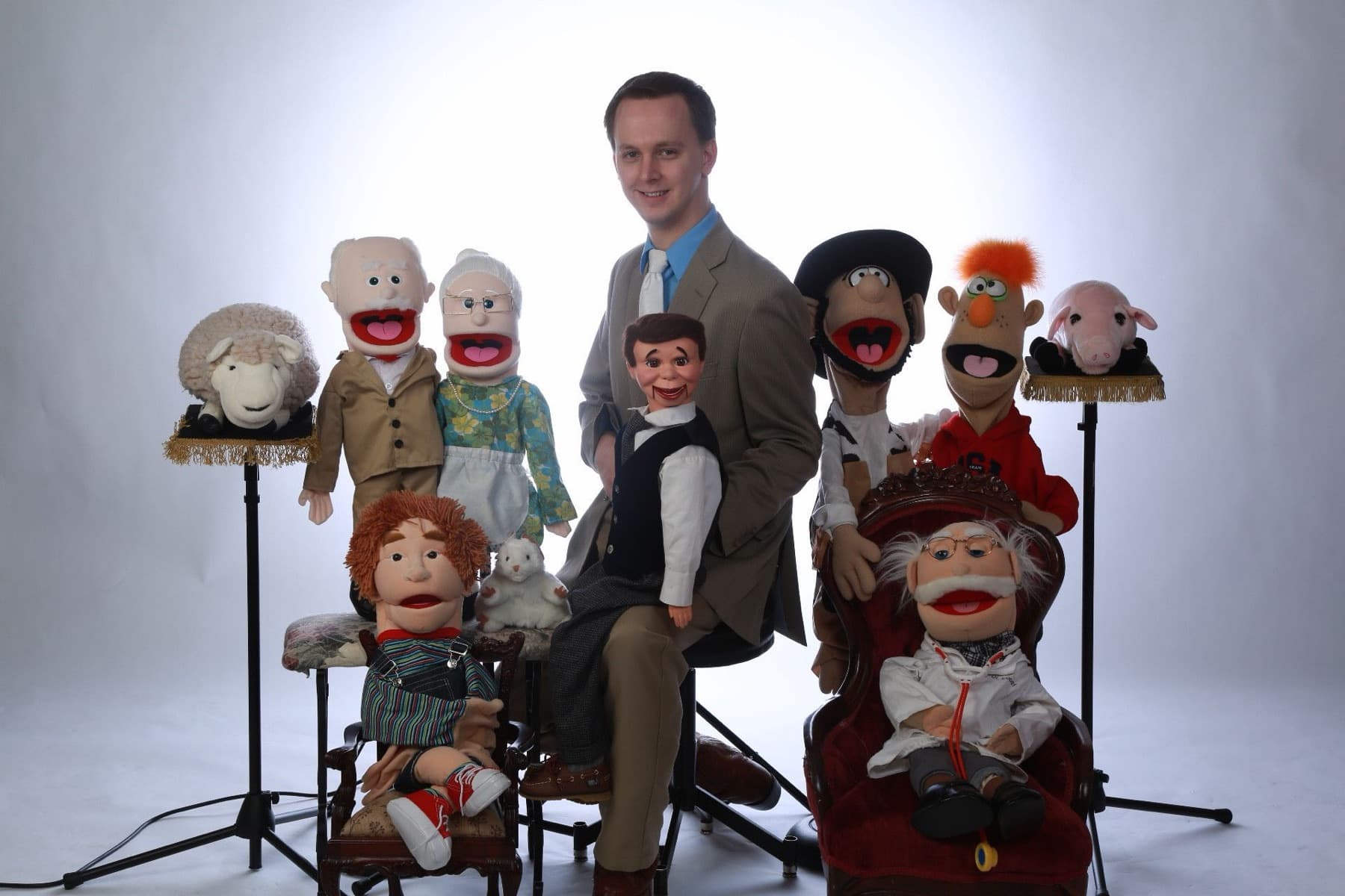 Stephen Forester with his full cast of puppets